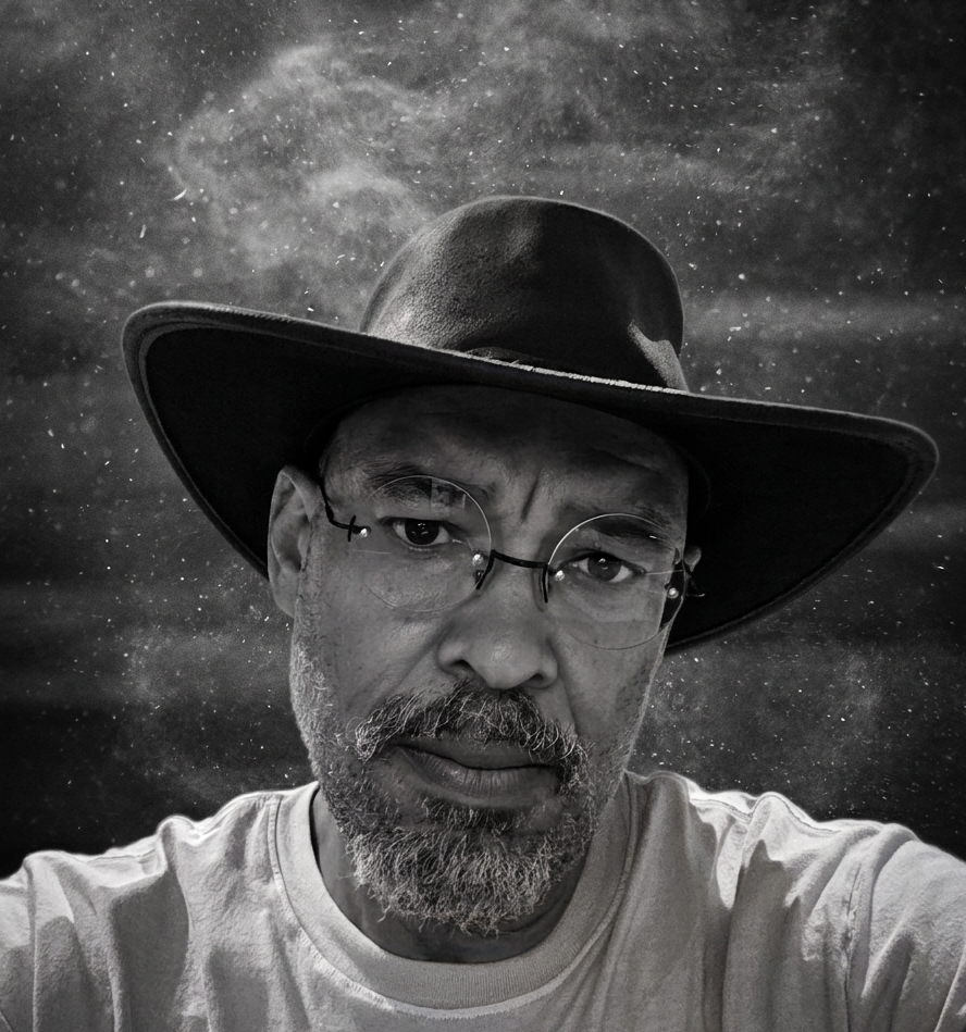 RC Notlim, author portrait in dramatic black and white